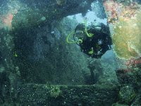 Swimming into a companion way on the wreck of the Kyokuzan Maru...