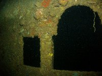 An ornate internal window within the wreck of the Olympia Maru, a former liner before the Japanese captured her and used her as a supply ship...