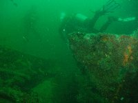 Dark green, silty water over the wreck of the New York...